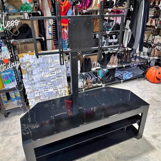 TV stand. With glass shelves